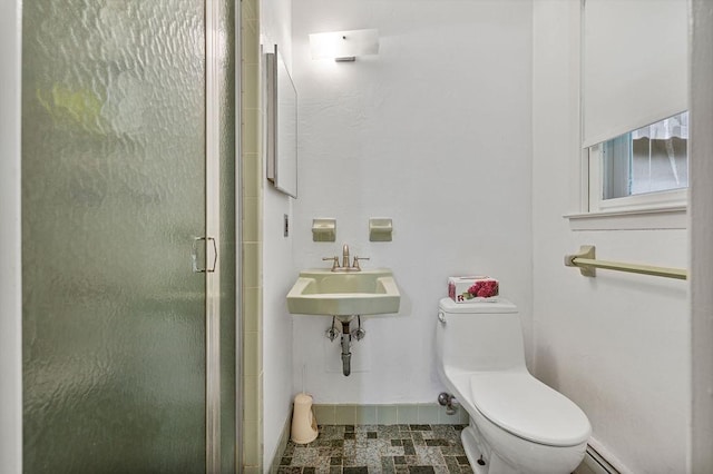 10 Karow Ct, Monsey, NY 10952 - bathroom with toilet, a stall shower, baseboards, and a sink