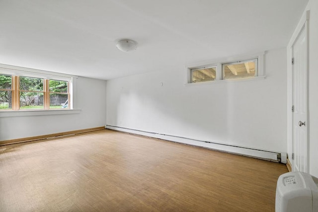 10 Karow Ct, Monsey, NY 10952 - unfurnished room with baseboard heating and wood finished floors