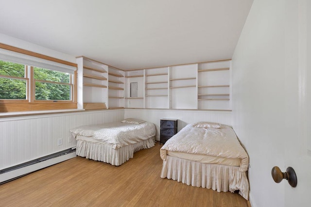 10 Karow Ct, Monsey, NY 10952 - bedroom featuring a baseboard radiator and wood finished floors