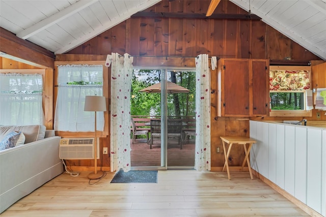 3300 Baker Unit 11, Mohegan Lake, NY 10547 - doorway to outside featuring wood-type flooring, wood walls, a wall unit AC, and wooden ceiling
