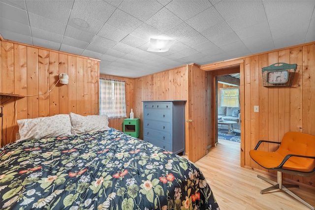 3300 Baker Unit 11, Mohegan Lake, NY 10547 - bedroom featuring wood finished floors and wood walls