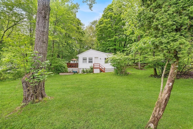 3300 Baker Unit 11, Mohegan Lake, NY 10547 - view of grassy yard featuring a wooden deck