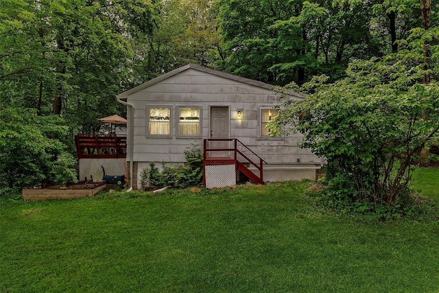 3300 Baker Unit 11, Mohegan Lake, NY 10547 - view of front of house with a front lawn and a wooden deck