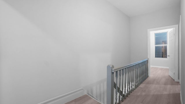 2448 Webb Ave, Bronx, NY 10468 - stairway featuring wood finished floors and baseboards