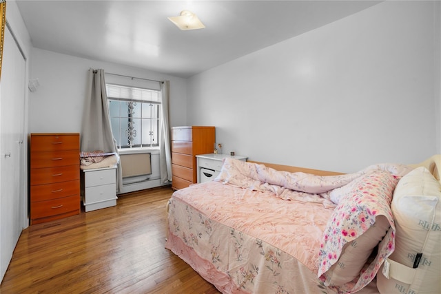 45-53 Parsons Blvd, Flushing, NY 11355 - bedroom featuring light wood-style floors and a baseboard radiator