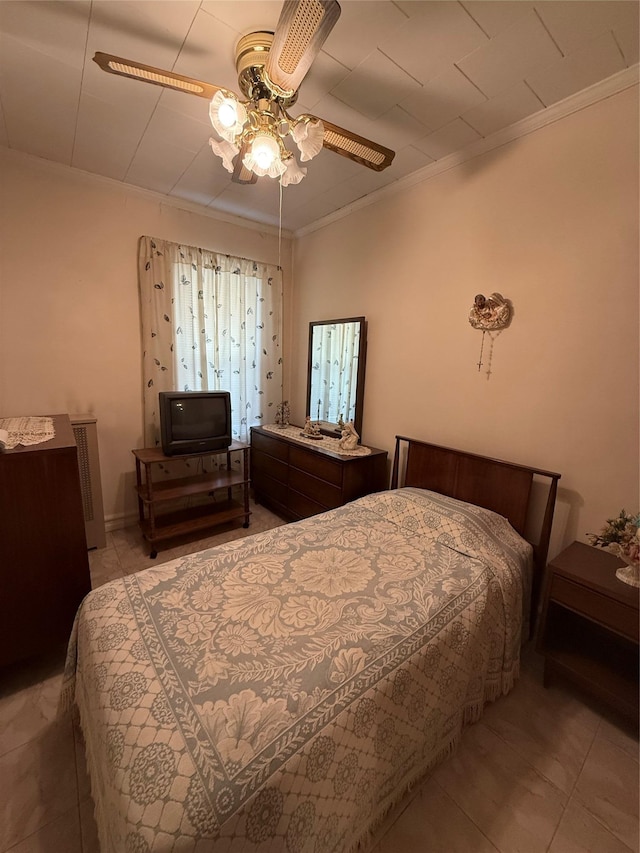 7542 67th Rd, Middle Village, NY 11379 - bedroom featuring ornamental molding, light tile patterned floors, and a ceiling fan