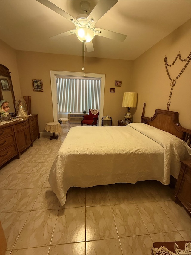 7542 67th Rd, Middle Village, NY 11379 - bedroom featuring light marble finish floors and ceiling fan