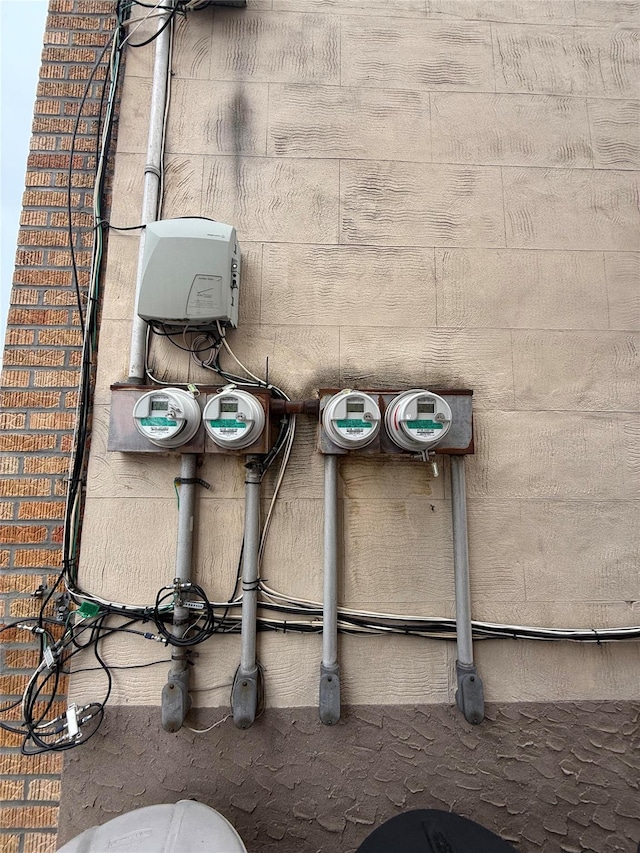 7542 67th Rd, Middle Village, NY 11379 - exterior view of electric meter and brick siding