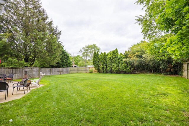 186 Montrose Dr, Port Jefferson Station, NY 11776 - view of yard with a patio area