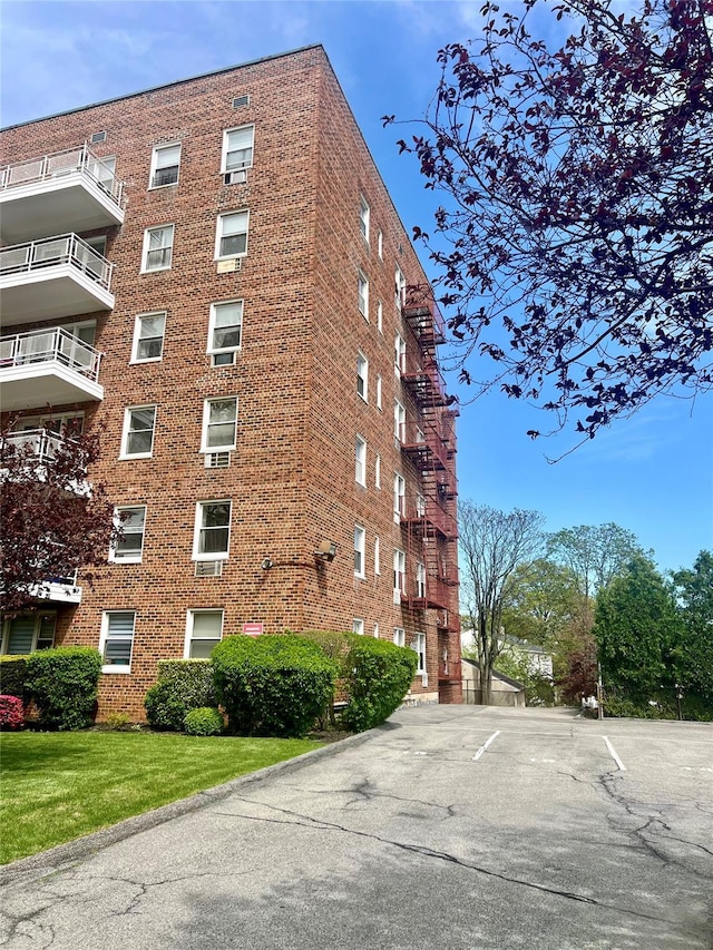 415 Gramatan Ave Unit 5D, Mount Vernon, NY 10552 - view of apartment building / complex with uncovered parking