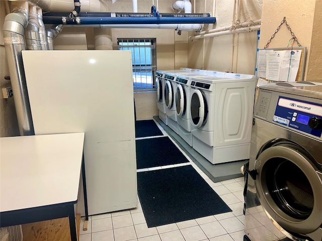415 Gramatan Ave Unit 5D, Mount Vernon, NY 10552 - communal laundry room featuring washer and clothes dryer and light tile patterned floors