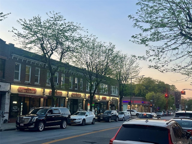 415 Gramatan Ave Unit 5D, Mount Vernon, NY 10552 - property at dusk featuring view of commercial area