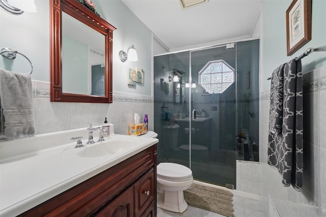 23 Waldron Dr, Stony Point, NY 10980 - bathroom with vanity, toilet, a stall shower, tile walls, and tile patterned flooring