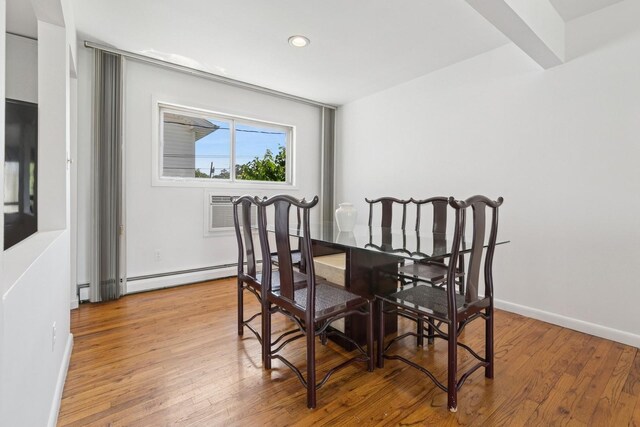 360 Robyn Pl, East Meadow, NY 11554 - dining room featuring light wood-style floors, recessed lighting, baseboards, and an AC wall unit
