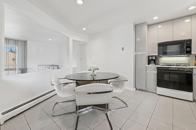 360 Robyn Pl, East Meadow, NY 11554 - dining space with a baseboard heating unit, recessed lighting, light tile patterned floors, and baseboards