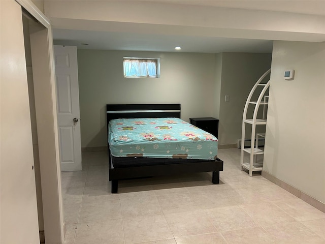 13-01 146th Pl, Whitestone, NY 11357 - tiled bedroom featuring baseboard heating and baseboards