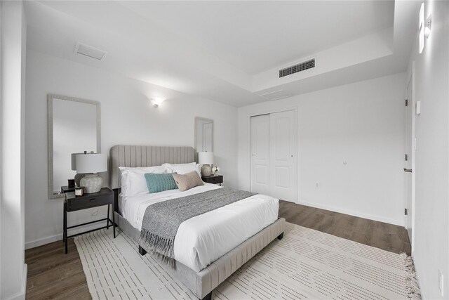 97-30 64th Ave Unit 3C, Rego Park, NY 11374 - bedroom with wood finished floors, a closet, and baseboards