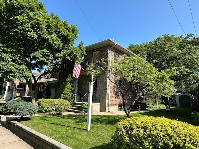 157-18 26th Ave, Flushing, NY 11354 - view of home's exterior featuring a lawn and brick siding