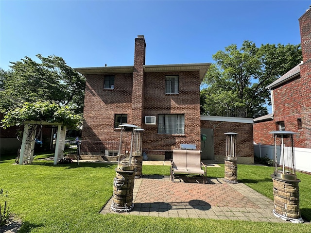 157-18 26th Ave, Flushing, NY 11354 - rear view of property with a chimney, a patio, and brick siding