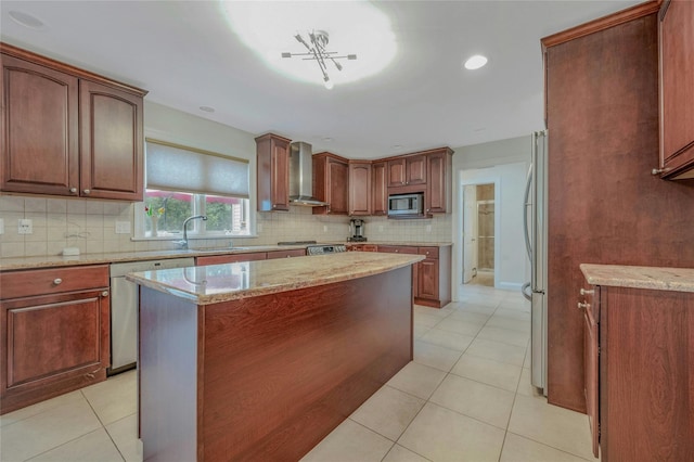 32 Robinhood Ln, East Setauket, NY 11733 - kitchen featuring stainless steel appliances, wall chimney exhaust hood, a sink, decorative backsplash, and light tile patterned floors