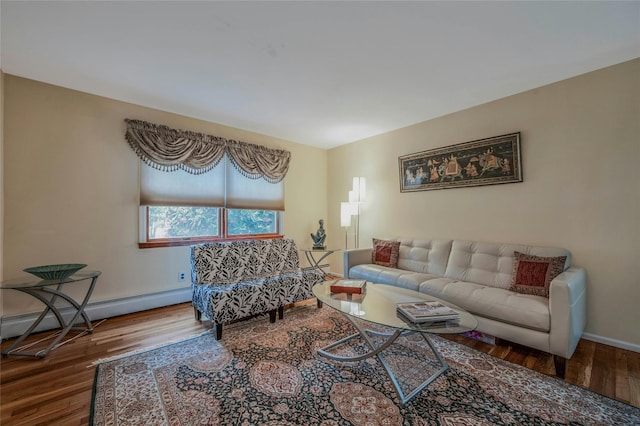 32 Robinhood Ln, East Setauket, NY 11733 - living area featuring wood finished floors, baseboards, and a baseboard radiator
