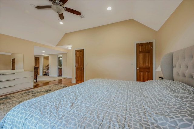 32 Robinhood Ln, East Setauket, NY 11733 - bedroom featuring vaulted ceiling, wood finished floors, recessed lighting, and a ceiling fan