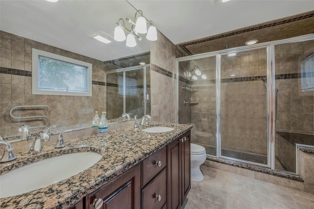 32 Robinhood Ln, East Setauket, NY 11733 - bathroom with toilet, a shower stall, and double vanity