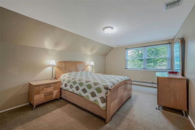 32 Robinhood Ln, East Setauket, NY 11733 - bedroom featuring a baseboard heating unit, light colored carpet, lofted ceiling, and baseboards