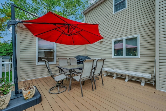 32 Robinhood Ln, East Setauket, NY 11733 - wooden deck featuring outdoor dining area