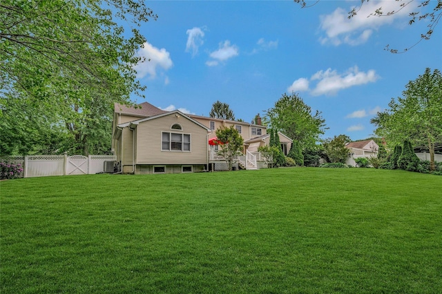 32 Robinhood Ln, East Setauket, NY 11733 - rear view of property with cooling unit