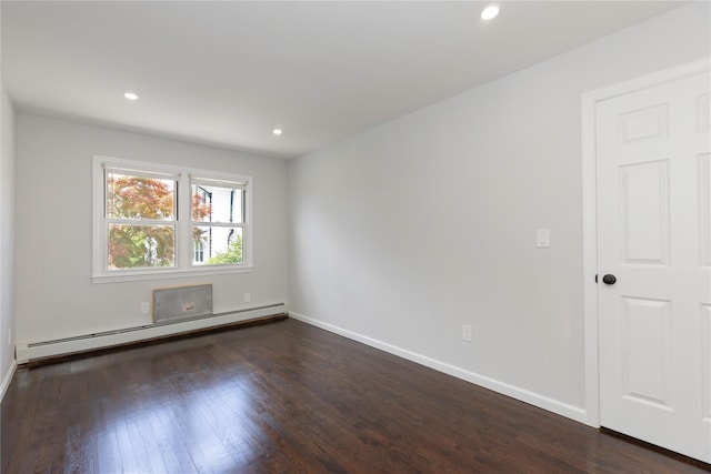 380 N Broadway Unit D4, Yonkers, NY 10701 - empty room with a baseboard radiator, dark wood-style floors, baseboards, and recessed lighting