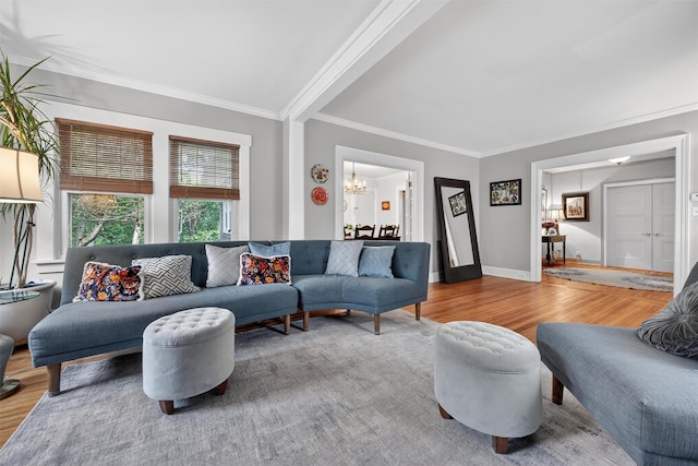 51 S Airmont Rd, Airmont, NY 10901 - living area featuring a chandelier, wood finished floors, and crown molding