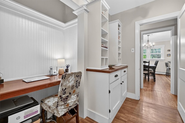 51 S Airmont Rd, Airmont, NY 10901 - office featuring light wood-style floors, a chandelier, ornate columns, and baseboard heating