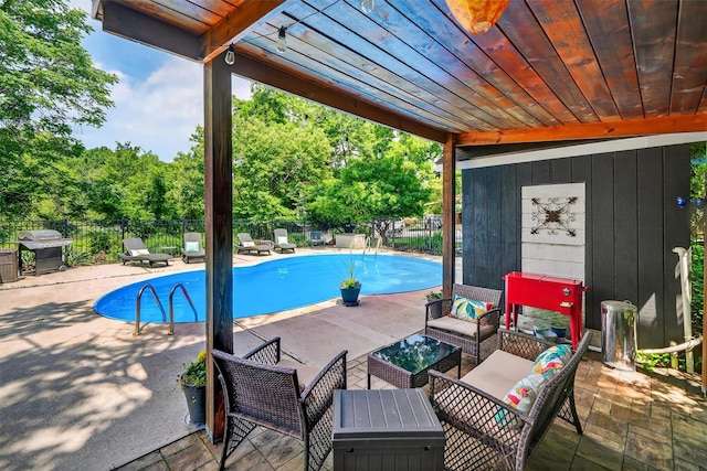 51 S Airmont Rd, Airmont, NY 10901 - view of pool with a fenced backyard, a grill, an outdoor living space, and a patio