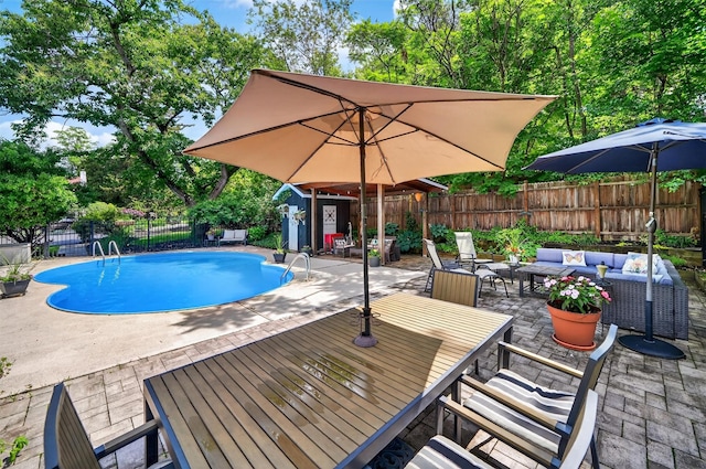 51 S Airmont Rd, Airmont, NY 10901 - view of pool featuring outdoor dining area, an outdoor living space, a patio area, and a fenced backyard