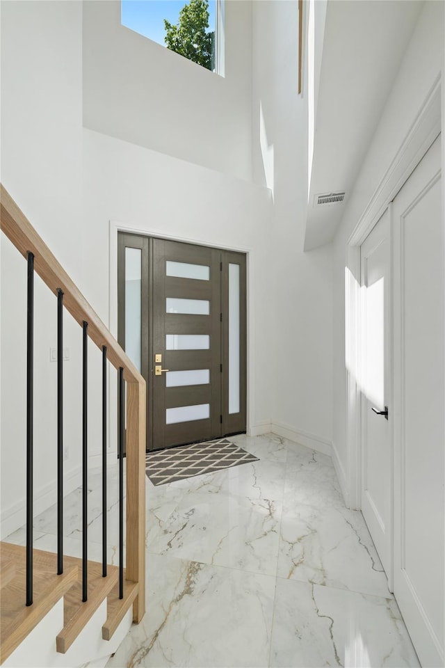 40 Singer Ave Unit 201, Spring Valley, NY 10977 - foyer with marble tiled flooring and a high ceiling