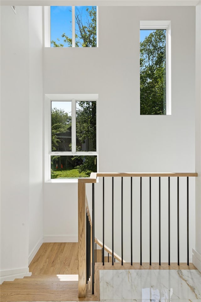 40 Singer Ave Unit 201, Spring Valley, NY 10977 - stairway with baseboards and wood finished floors