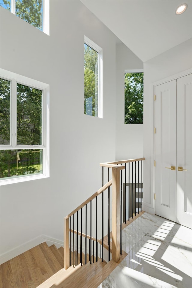40 Singer Ave Unit 201, Spring Valley, NY 10977 - stairway with recessed lighting and wood finished floors