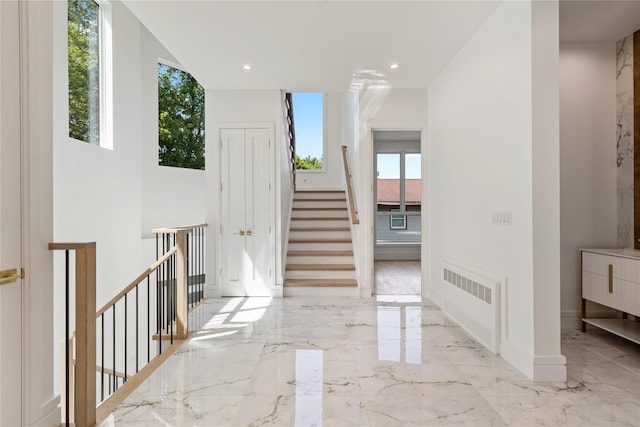 40 Singer Ave Unit 201, Spring Valley, NY 10977 - corridor featuring light marble finish flooring, stairs, and recessed lighting