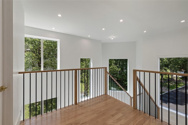 40 Singer Ave Unit 201, Spring Valley, NY 10977 - hallway with recessed lighting, healthy amount of natural light, an upstairs landing, and wood finished floors