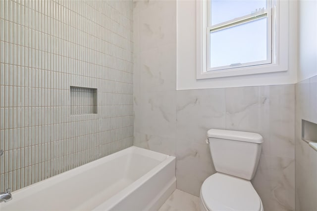 40 Singer Ave Unit 201, Spring Valley, NY 10977 - full bathroom featuring tile walls and toilet