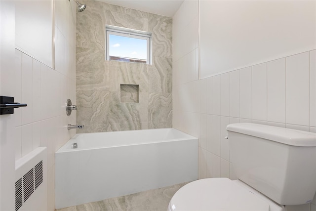 40 Singer Ave Unit 201, Spring Valley, NY 10977 - bathroom featuring tile walls and tub / shower combination