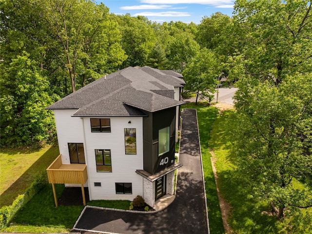 40 Singer Ave Unit 201, Spring Valley, NY 10977 - aerial view of property and surrounding area featuring a heavily wooded area