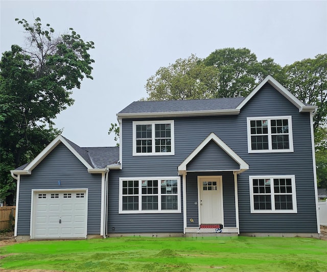 28 Cedar Branch St, Middle Island, NY 11953 - view of front of home featuring a garage and a front yard