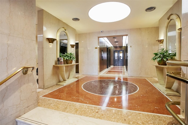 110-11 Queens Blvd Unit 27G, Forest Hills, NY 11375 - building lobby featuring a surveillance system