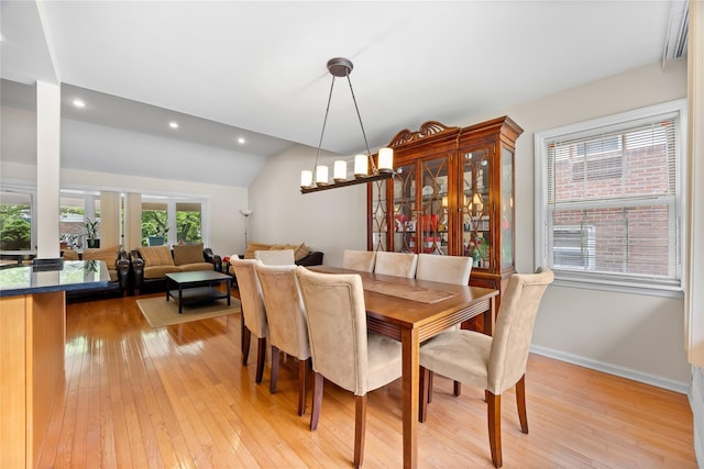 222-47 Garland Dr, Bayside, NY 11364 - dining room with vaulted ceiling, light wood-style flooring, recessed lighting, and baseboards
