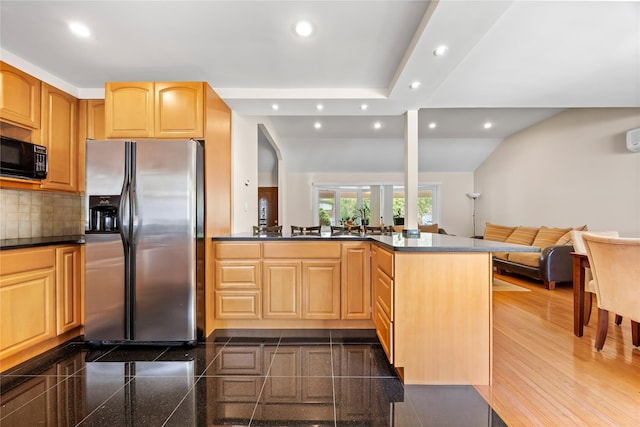 222-47 Garland Dr, Bayside, NY 11364 - kitchen featuring stainless steel refrigerator with ice dispenser, recessed lighting, black microwave, granite tiled floors, and dark countertops