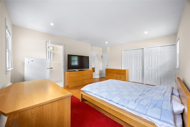 222-47 Garland Dr, Bayside, NY 11364 - bedroom featuring multiple closets, recessed lighting, and wood finished floors