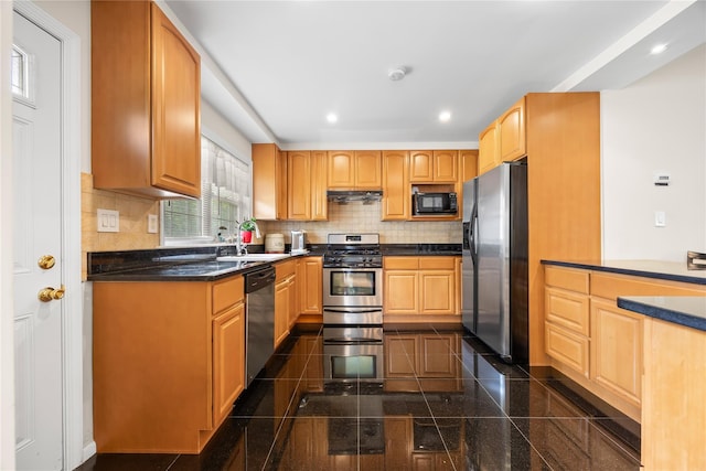 222-47 Garland Dr, Bayside, NY 11364 - kitchen with appliances with stainless steel finishes, a sink, granite floors, under cabinet range hood, and backsplash