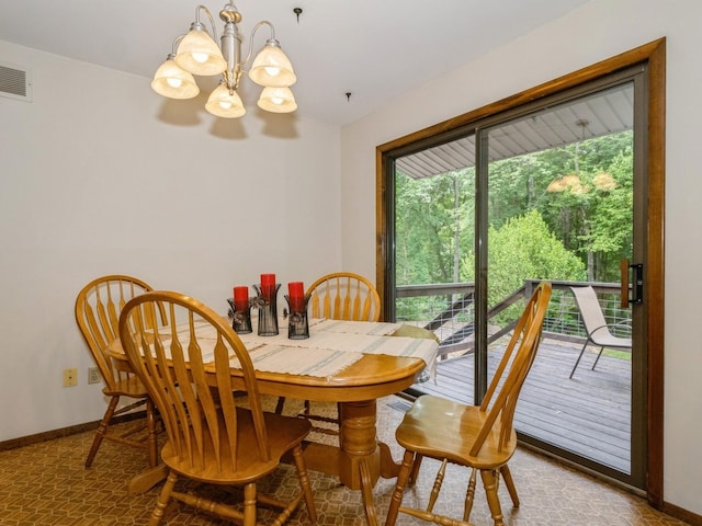 29 Sachson Pl, Wappingers Falls, NY 12590 - dining room with a chandelier and baseboards